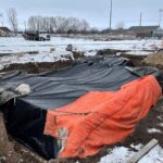 covering surge tank